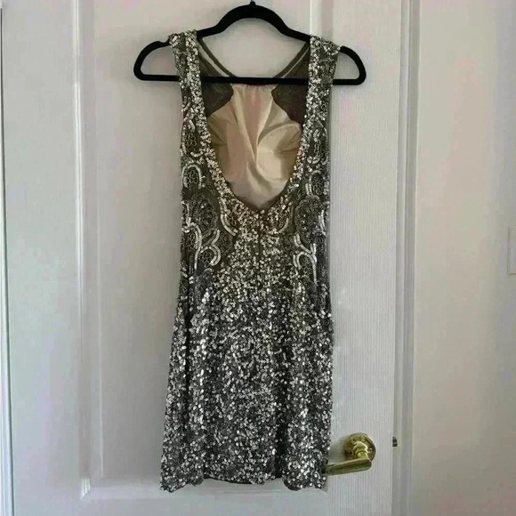 Woman’s mini beaded  silver dress in size x-small - Picture 3 of 5
